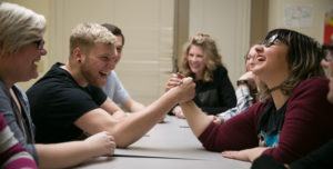 Students arm wrestling