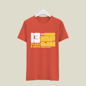 orange 2021 Designathon shirt designed by Maddie Lyash '21, Graphic Design