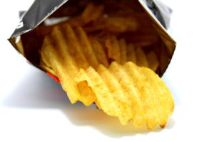 potato chips and bag on blank white