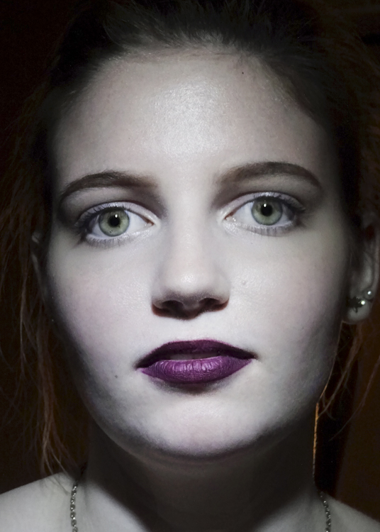 closeup photo of young woman with red lips, courtesy Len DeLessio