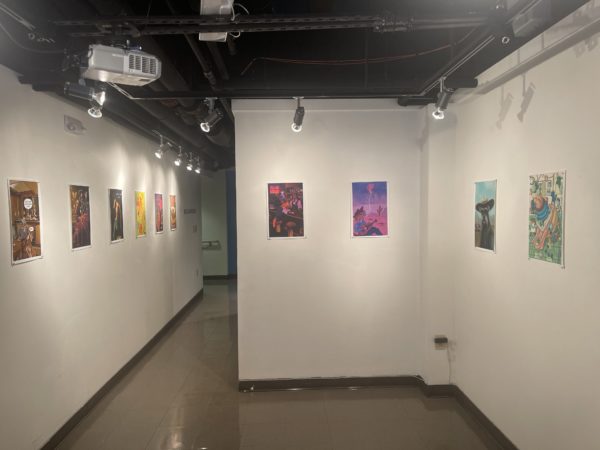 photo of CORE Gallery walls at the college with illustrations that are part of Dog in a Cowboy Hat exhibition.